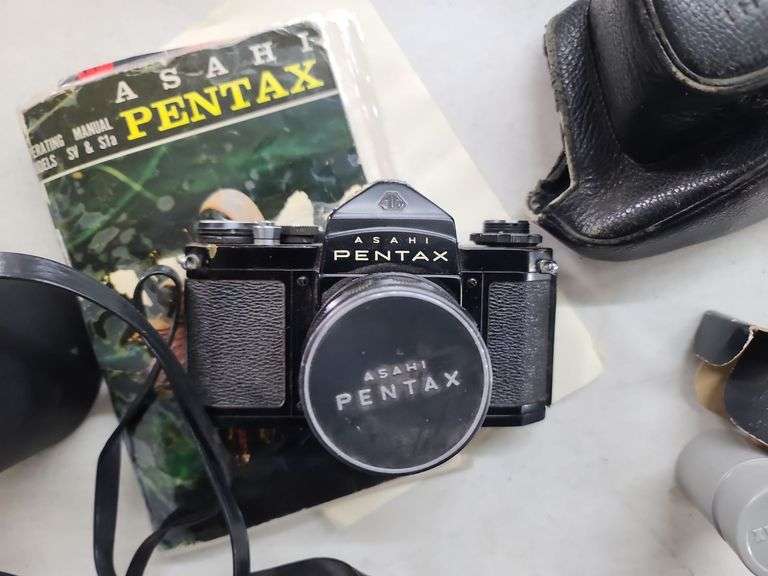 Pentax 35mm Camera, with Case, Empty Lens Case, Magazine, and Manual