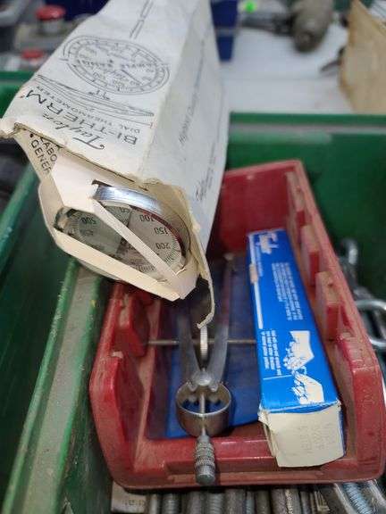 Bin of Turnbuckles, Compass and Thermometer