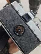 Minolta SrT101 35mm Camera and Soligor Telephoto Lens with Case