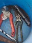 Bucket of Garage Tools: Funnels, Window Squeegee, Sheers, and Battery Tester (untested)