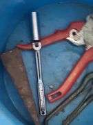 Bucket of Garage Tools: Funnels, Window Squeegee, Sheers, and Battery Tester (untested)