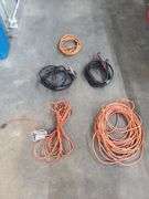 Three Extension Cords, Various Lengths, One with Shop Light and Two Jumper Cables
