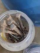 Tote and Two Large Plastic Containers of Bolts, Hinges, Dowels, Hooks, and Tubing