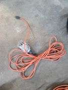 Three Extension Cords, Various Lengths, One with Shop Light and Two Jumper Cables
