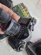 Pentax 35mm Camera, with Case, Empty Lens Case, Magazine, and Manual