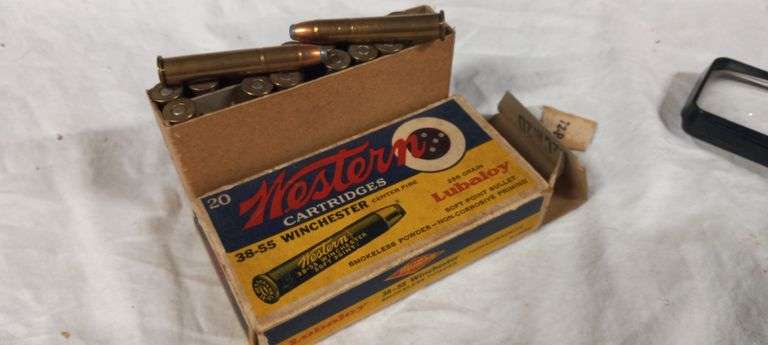 16 rnds 38-55 Win & 3 empty brass