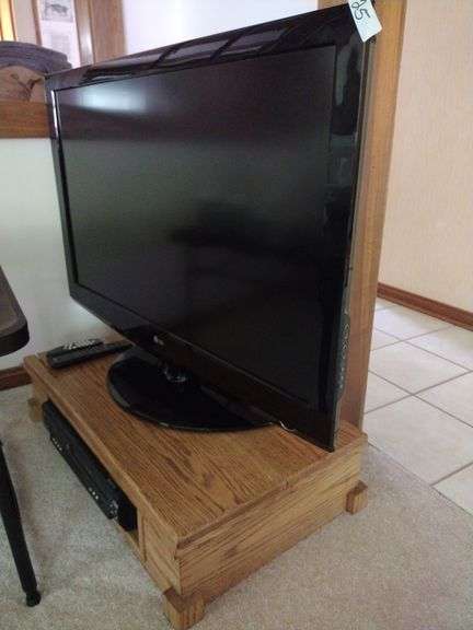 42" LG TV, Oak Floor Stand Approx 33"x8"x19", Symphonic DVD, VHS Player - Works