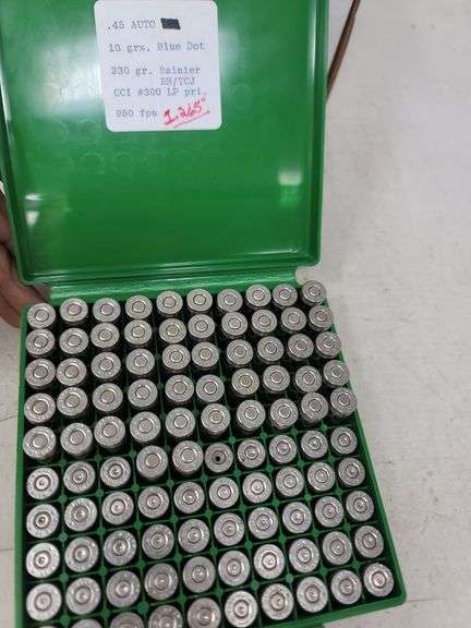 52 live rounds and 48 spent 45 acp reloads