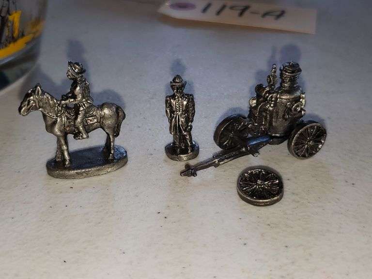 9 Miniature Metal Figurines (Wagon Wheel Broken)