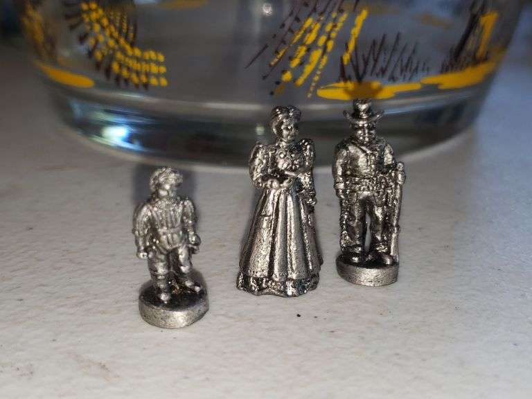 9 Miniature Metal Figurines (Wagon Wheel Broken)