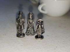 9 Miniature Metal Figurines (Wagon Wheel Broken)