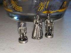 9 Miniature Metal Figurines (Wagon Wheel Broken)