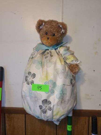 Clock, Temperature Gauge, Sign, And Bag Bear