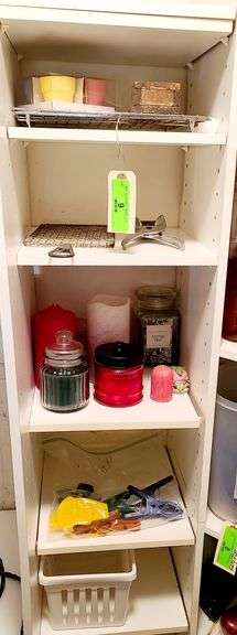 Contents of Five Shelves: Plastic Basket, Candles, Bag Clips, Citrus Juicer and Vintage Potato Grater