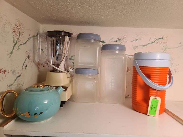 Contents of Top Shelf: Plastic Containers, Drink Cooler, Blender and Teapot