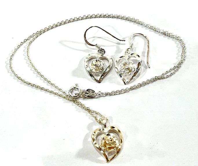 Silver necklace and earring set