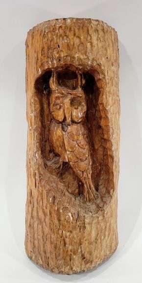 Carved Wooden Owl inside Tree Trunk