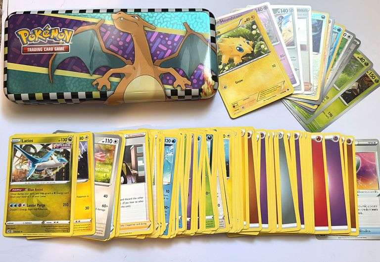 Charizard Collectors Tin Assorted Cards Black And Gold Auctions 