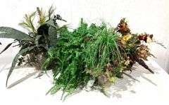 (4) Faux Potted Plants