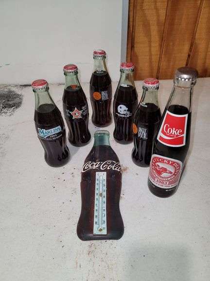 Commemorative Coke Bottles and Coke Thermometer
