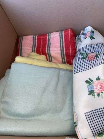 Box of vintage blankets and throws