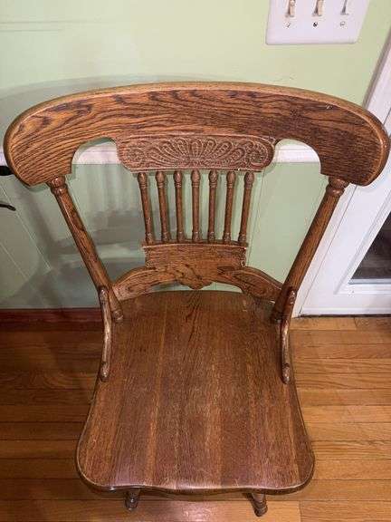 Vintage solid wood swivel bar stool.