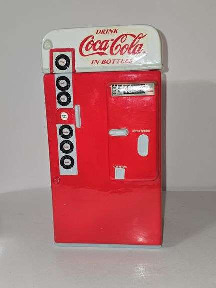 Vintage Coca-Cola vending machine cookie jar.