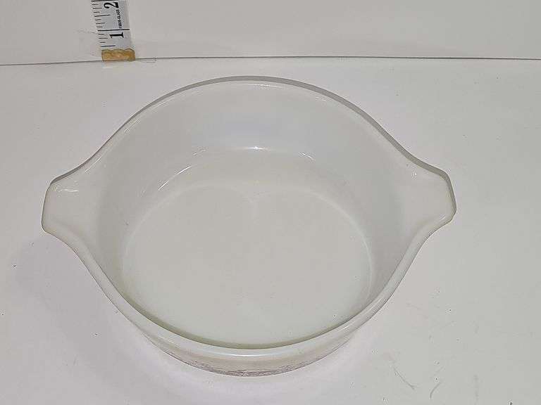 Vintage PYREX casserole dish in the "Forest Fancies" pattern.