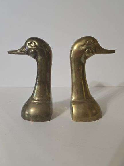 Vintage brass duck head bookends.