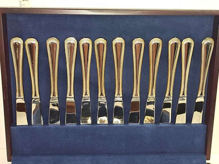 Stainless Steel flatware in wooden storage box