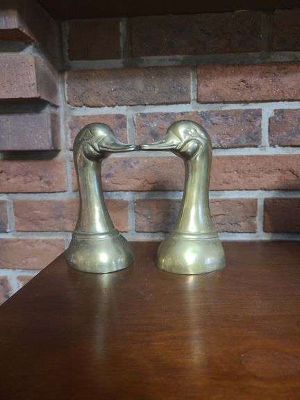 Vintage brass duck head bookends.