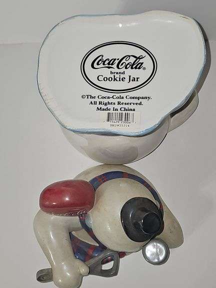Coca-Cola Snowman using a bottle opener cookie jar.
