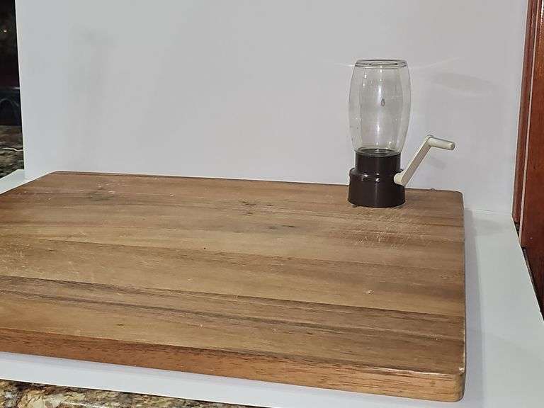 Wooden cutting board and vintage kitchen items