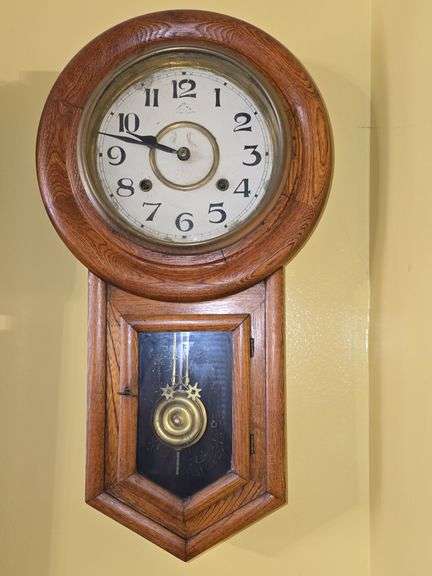 Wall clock with key