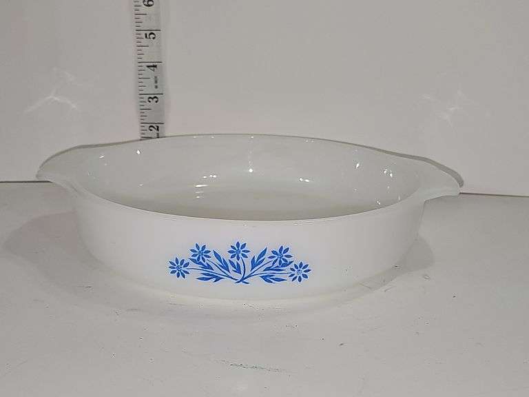 Vintage Anchor Hocking Fire King casserole dish with a blue cornflower pattern.