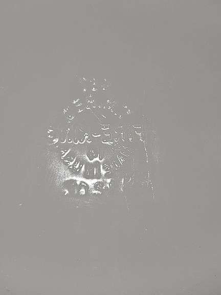 Fire-King casserole dish with the "Golden Wheat" pattern.