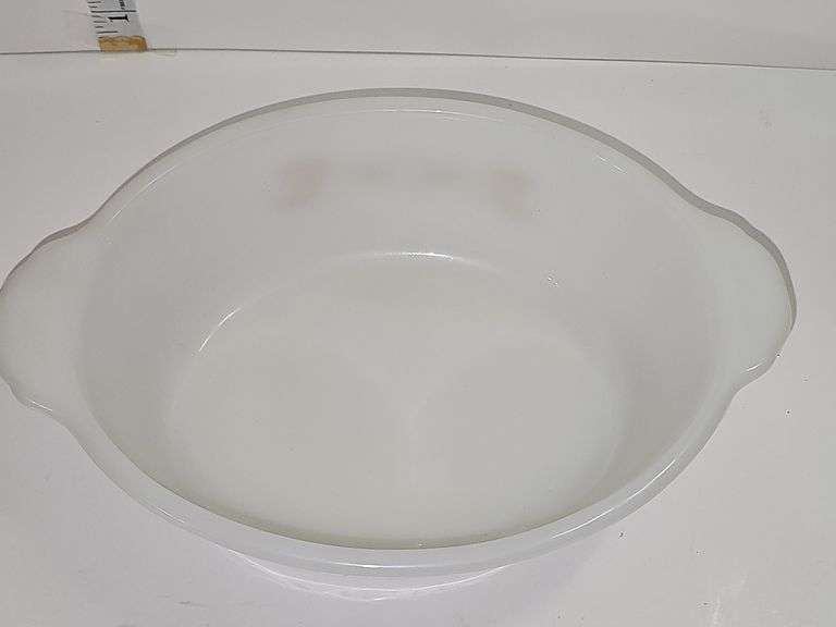 Fire-King casserole dish with the "Golden Wheat" pattern.