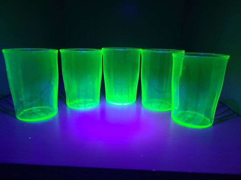 Green depression glass juice glasses. (Uranium Glasses)