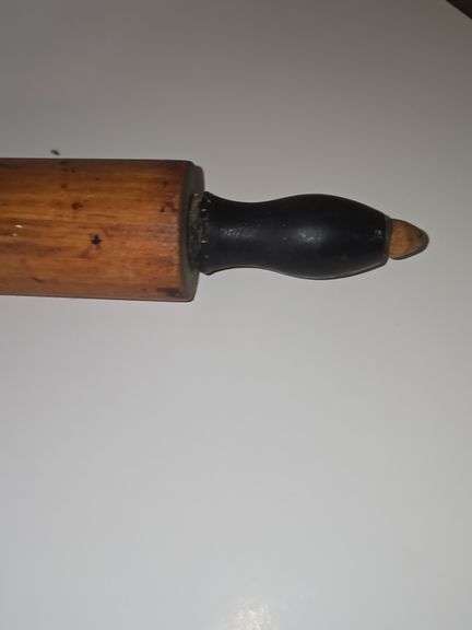 Dark wood rolling pin