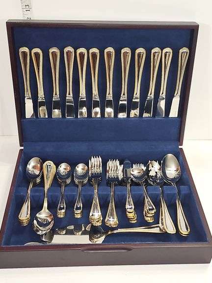 Stainless Steel flatware in wooden storage box