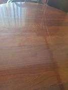 Table, 3 leaves. Includes 1 capatins chair & 5 dining chairs