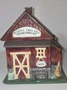 Coca-Cola barn-shaped ceramic cookie jar.