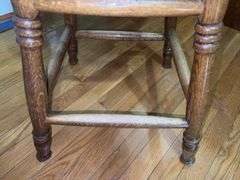 Vintage solid wood swivel bar stool.