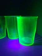 Green depression glass juice glasses. (Uranium Glasses)