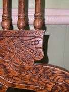 Vintage solid wood swivel bar stool.