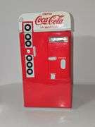 Vintage Coca-Cola vending machine cookie jar.