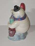 Coca-Cola Snowman using a bottle opener cookie jar.
