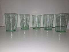 Green depression glass juice glasses. (Uranium Glasses)