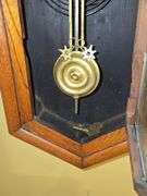 Wall clock with key