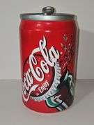 Vintage Coca-Cola can-shaped ceramic cookie jar.